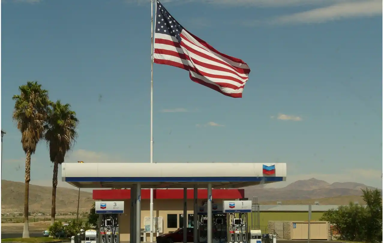 Gas station fuel dispensers with payment terminals, illustrating EMV migration and the role of cable infrastructure in secure CRIND system communication