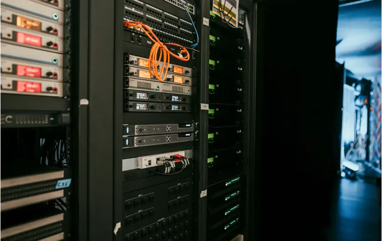 Commercial AV equipment rack with connected control systems, illustrating how control cable supports communication between audio, video, and automation platforms