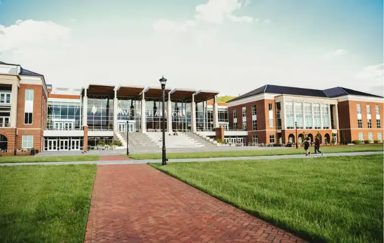 Commercial campus building connected by outdoor network infrastructure supporting inter-building communications and connected systems