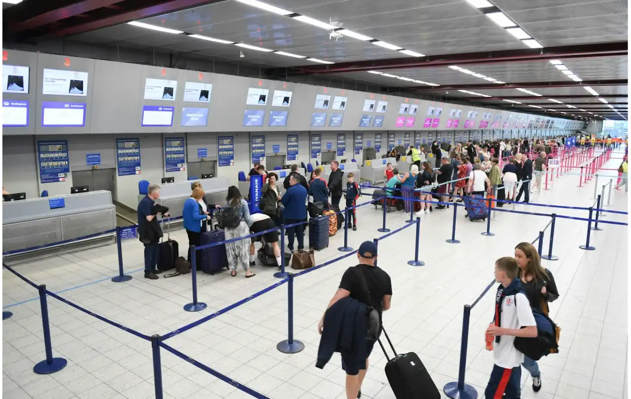Airport terminal with large public gathering area, illustrating complex commercial environments where public safety DAS systems support reliable in-building communication